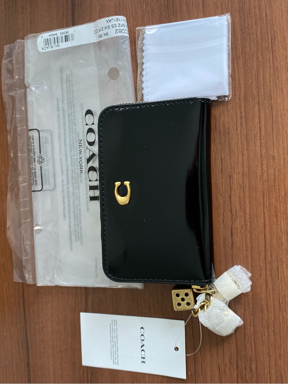 Coach Black Spazzolato Leather Zip Card Case with Dice, Heart and Tag Charm